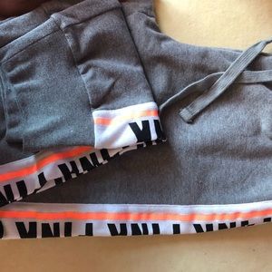 “Pink” grey sweatpants.